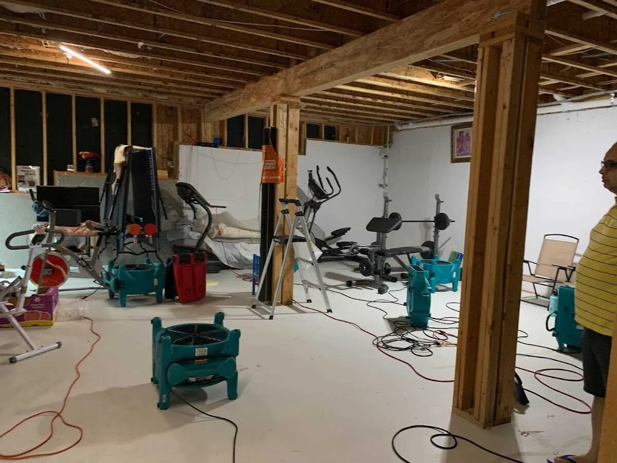 Basement drying equipment setup for Contents Cleaning & Restoration in Siloam Springs